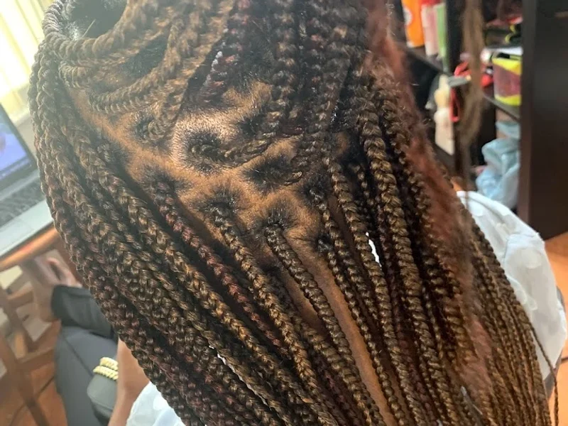 Didi’s Hair braiding services. $20 non refundable deposit required