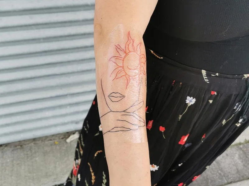 Golden Cicada Tattoo and Piercing