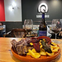 pollos asados de Crucero León