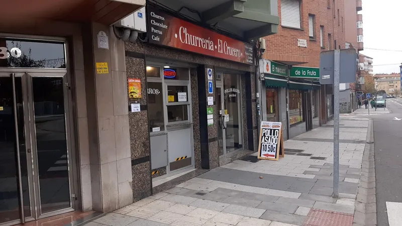 Churrería Asador EL CRUCERO Pollos asados Empanaditas