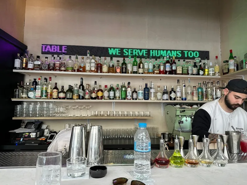 THE BAR IN FRONT OF THE BAR