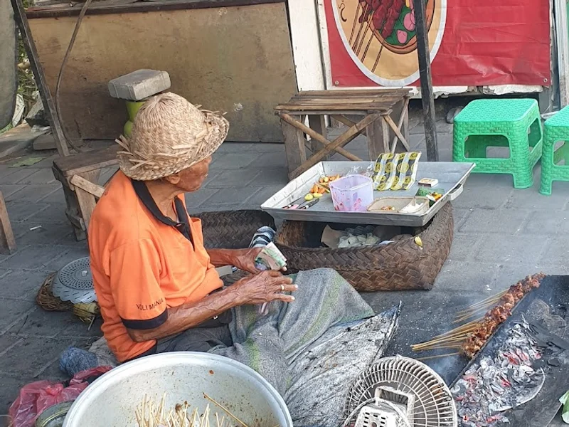 Dagang Sate Pekak Renda
