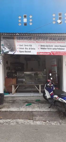 Service laptop Malaka