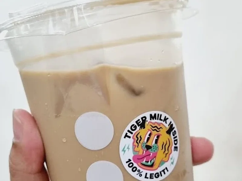 Kopi Titik Koma Siwalankerto