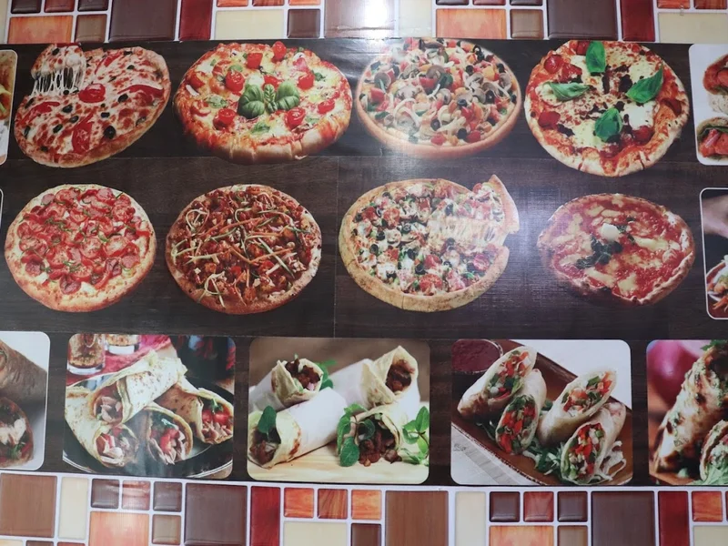 Tasty Bite Pizza's - Best Cafe in Selaqui, Pizza Restaurants in Selaqui, Family Restaurant in Seiakui