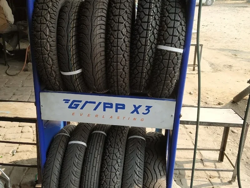 Avadhesh Singh,bike repairing and ceat tyre