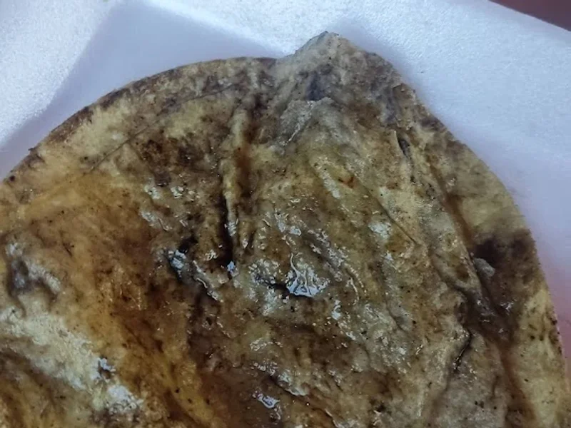 Hamburguesas al carbón “La Parrilla”