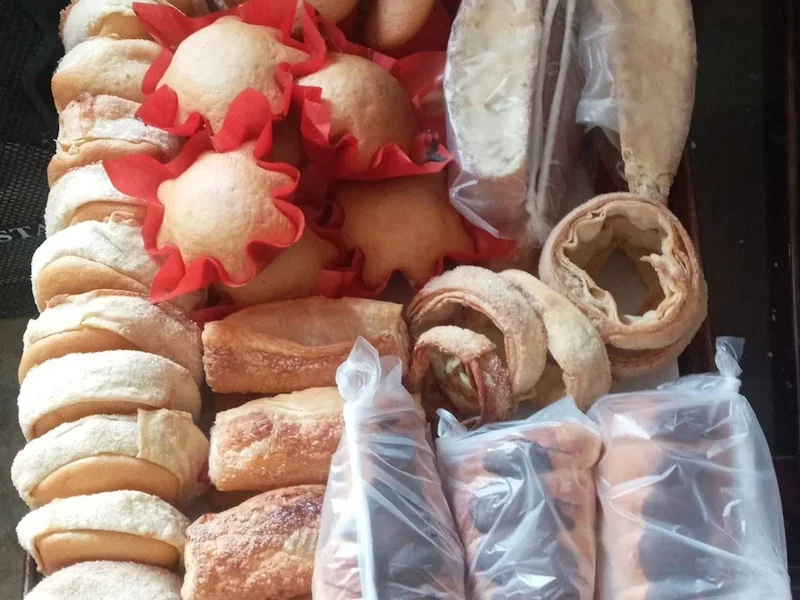 Panaderia Amor y el panadero con el pan