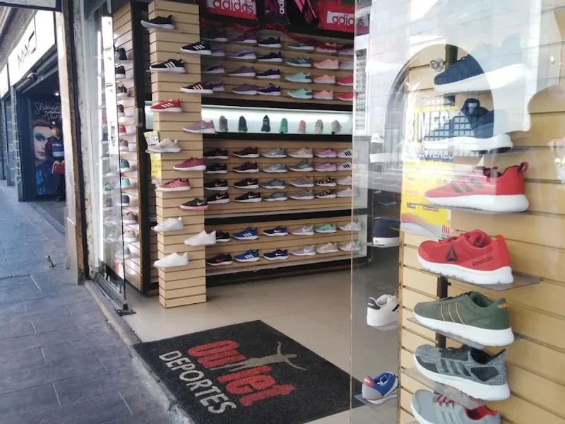 Outlet deportes Isabela Católica 1