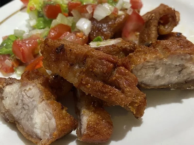 "Carnitas don Rufino"