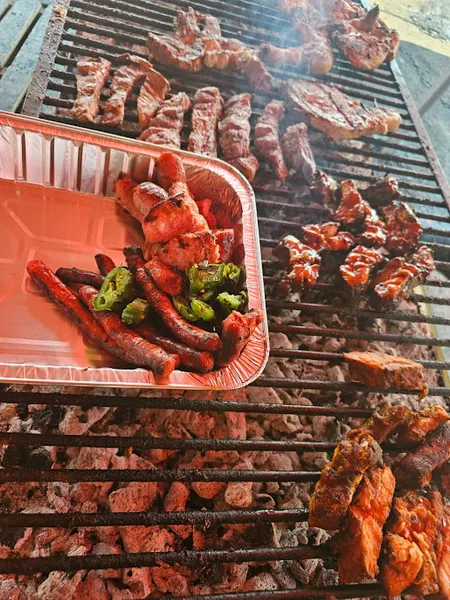 Pollos Y Costillares Al Carbon "Farias".