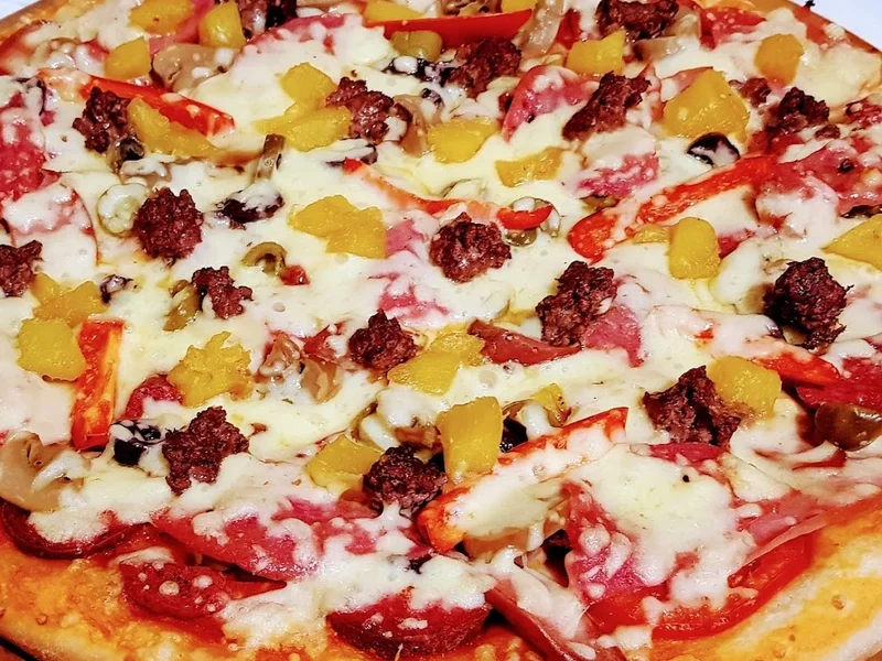 Trattoria Pizzeria Carbón y Sabor