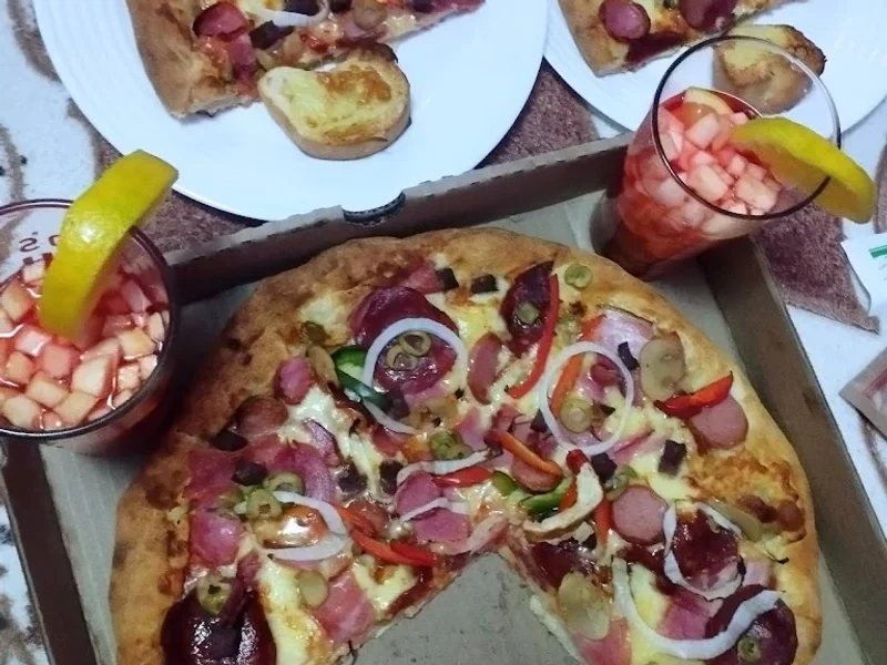 Pizza Raul JOSE GRANDA