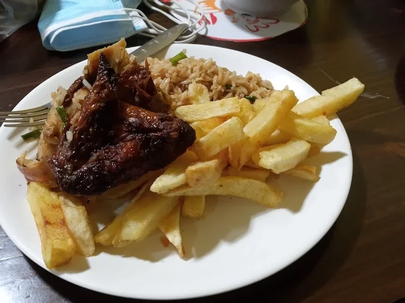 POLLOS A LA BRASA "LA CURVA"