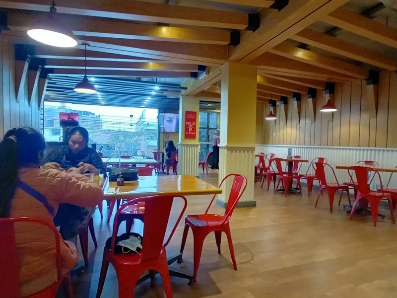 Excelencia l Pollos a la Brasa