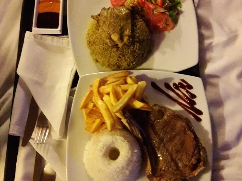 Ginebra Hotel & Suites