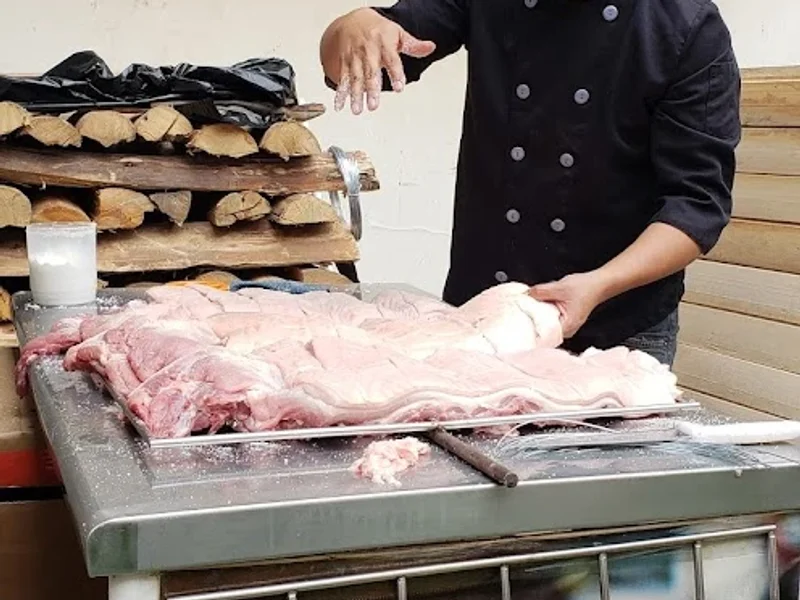 Chancho al palo de Juanito