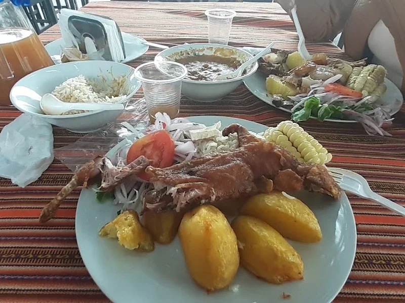 Chancho al Palo Taita Deme