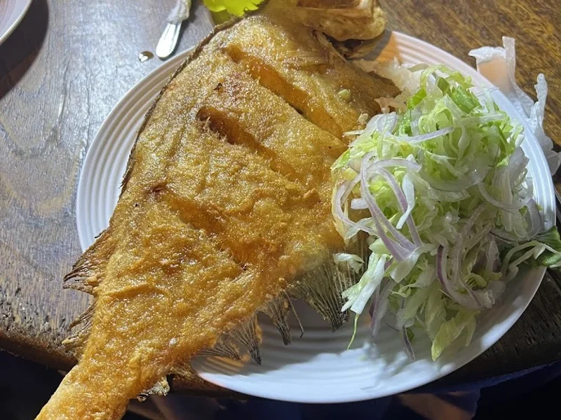 Cuchita pescado frito al paso