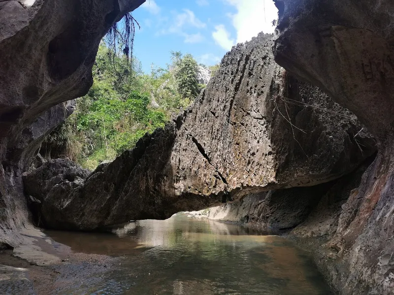 MALANGAAN CAVE AND SPRING /MOUNT SECRET