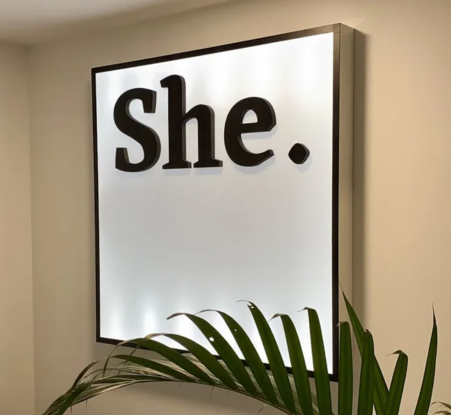 SHE.