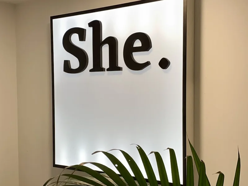 SHE.