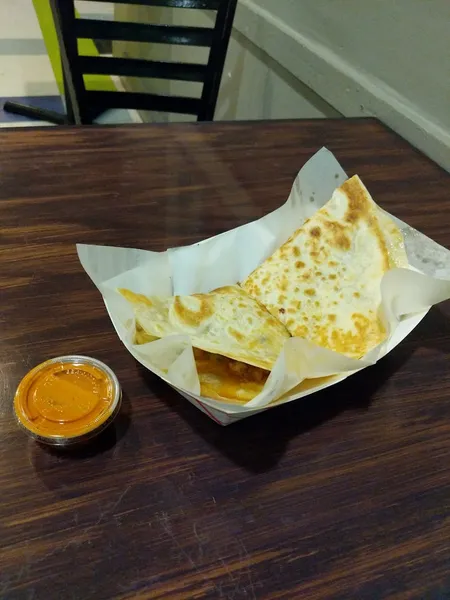 chicken quesadilla Iguanas Home Of The Burritozilla