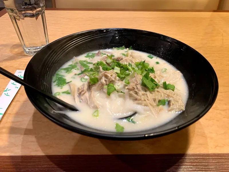 chicken rice soup A Bowl Of Chicken Soup And Rice Noodles