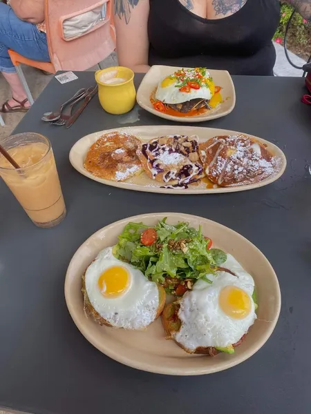 fried eggs Snooze, an A.M. Eatery