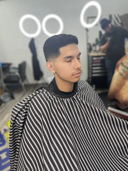 barber shops Cuts By April