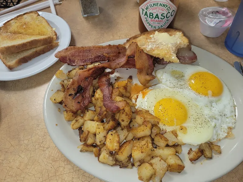 fried eggs Snooze, an A.M. Eatery