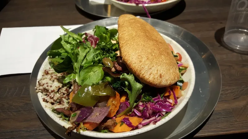 garlic bread Roti Mediterranean Bowls. Salads. Pitas. in Hyde Park