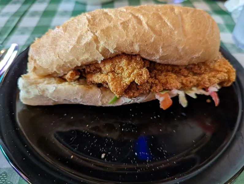 chicken sandwiches Daisy's Po-Boy and Tavern