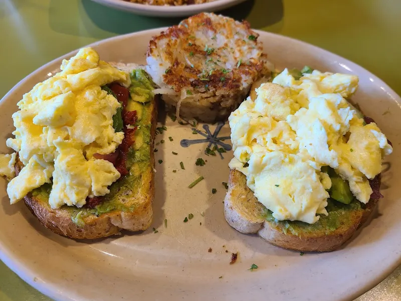 avocado toast Snooze, an A.M. Eatery