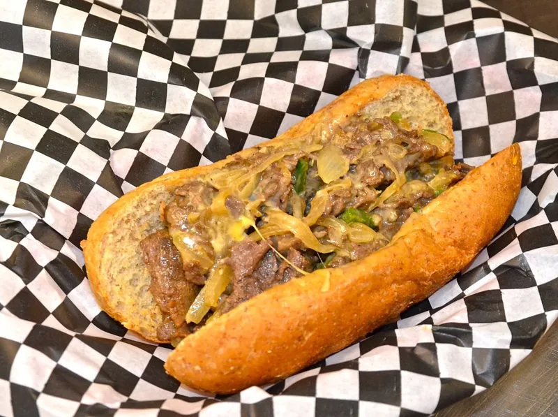 philly cheesesteaks Wholly Cow Burgers