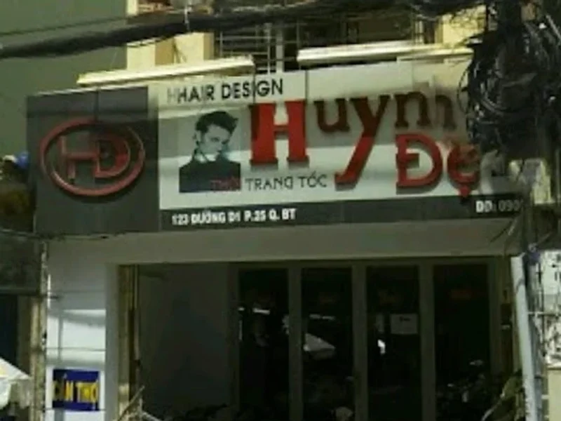 tiệm cắt tóc Huynh Đệ