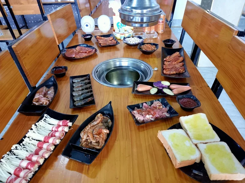 Nhà Hàng Hoa Quân Buffe Lẩu Nướng