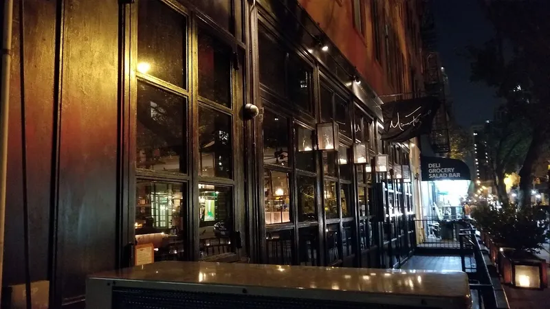 Dining ambiance of restaurant Marc Forgione 1