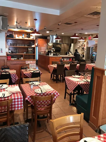 Dining ambiance of restaurant Grimaldi's Coal Brick-Oven Pizzeria 1