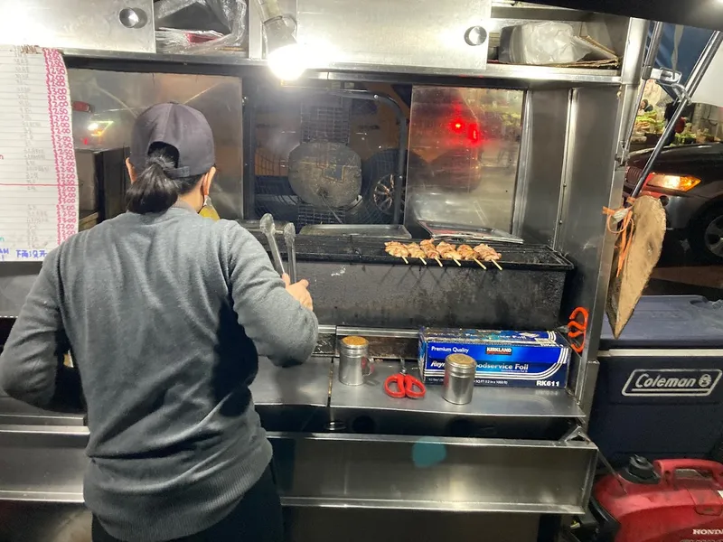 Dining ambiance of restaurant Grand Street Skewer Cart 1