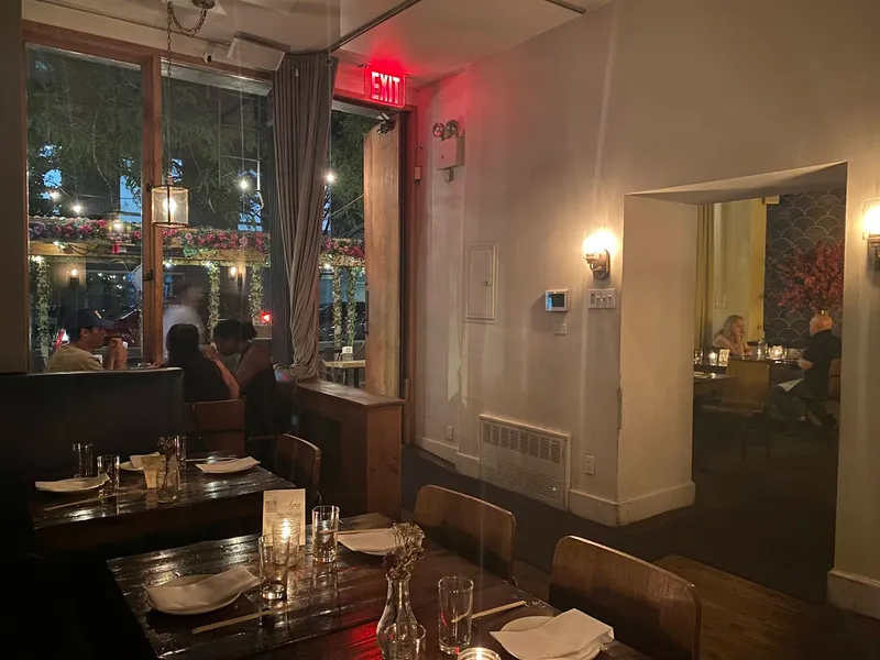 Dining ambiance of restaurant Ama Raw Bar East Village 3