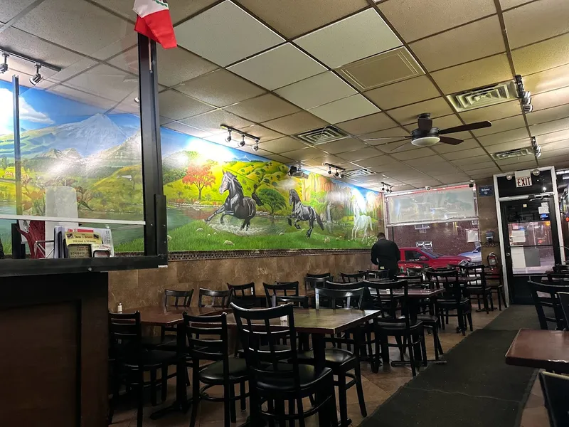 Dining ambiance of restaurant Tacos El Bronco 1