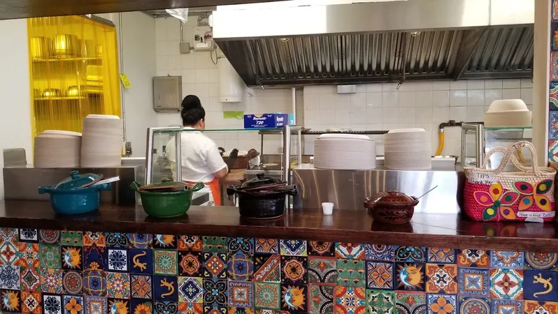 Dining ambiance of restaurant Taqueria Al Pastor 1