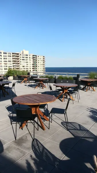 Dining ambiance of restaurant The Roof at The Rockaway Hotel 2