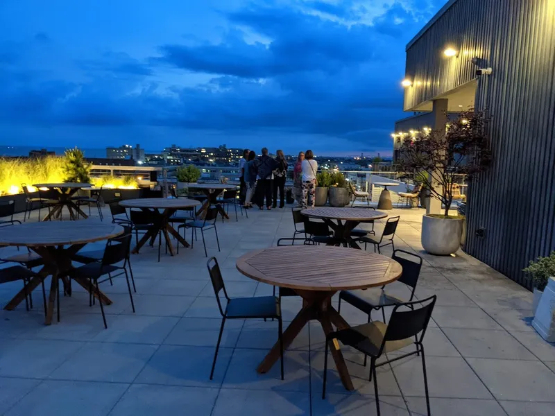 Dining ambiance of restaurant The Roof at The Rockaway Hotel 3