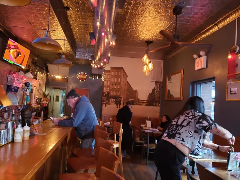 Dining ambiance of restaurant East Harlem Bottling Co. 3