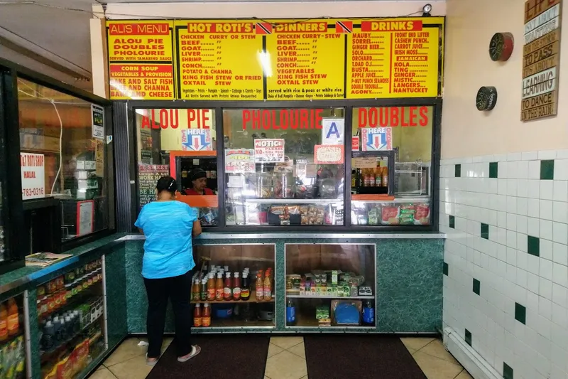 Dining ambiance of restaurant Ali's Trinbago Roti Shop 1