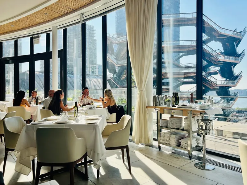 Dining ambiance of restaurant estiatorio Milos Hudson Yards 1