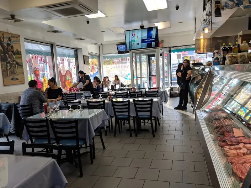 Dining ambiance of restaurant La Esquina Criolla 2