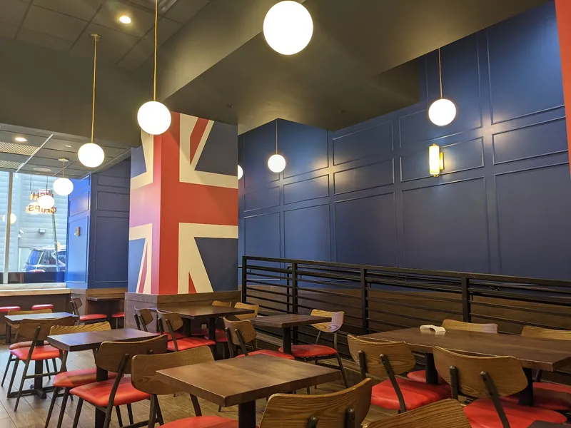 Dining ambiance of restaurant Gordon Ramsay Fish & Chips 1